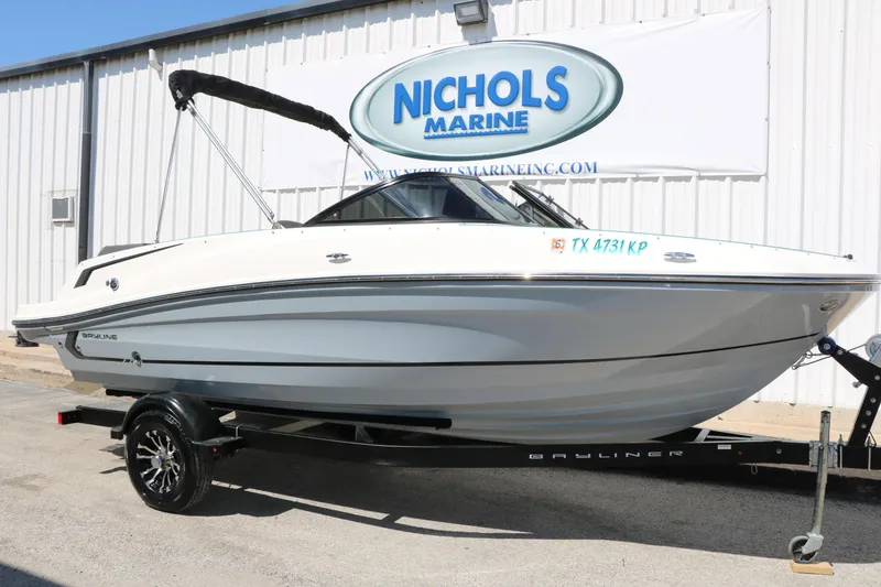 Slide: The Image of 2022 Bayliner VR5 Bowrider I/O on trailer at Nichols Marine dealership. - 6