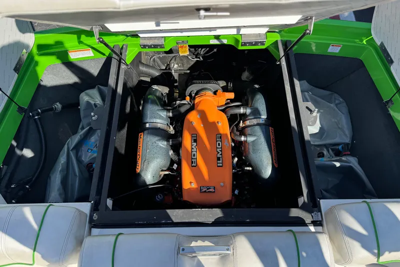 Slide: The Image of Engine compartment of a 2013 MasterCraft XStar boat with Ilmor engine. - 25
