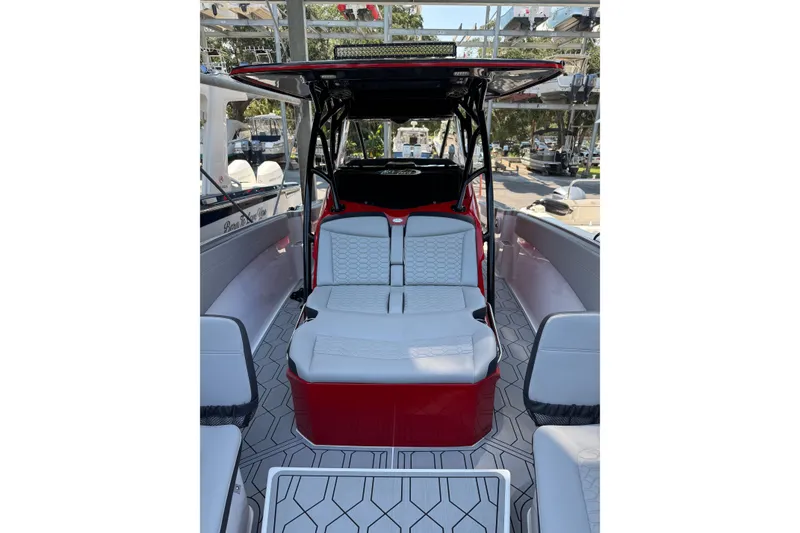 Slide: The Image of 2024 Nor-Tech 340 Sport Center Console with sleek seating and modern design. - 6