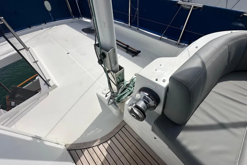 Slide: The Image of Deck view of 2015 Beneteau Swift Trawler 44 with seating and winch. - 25