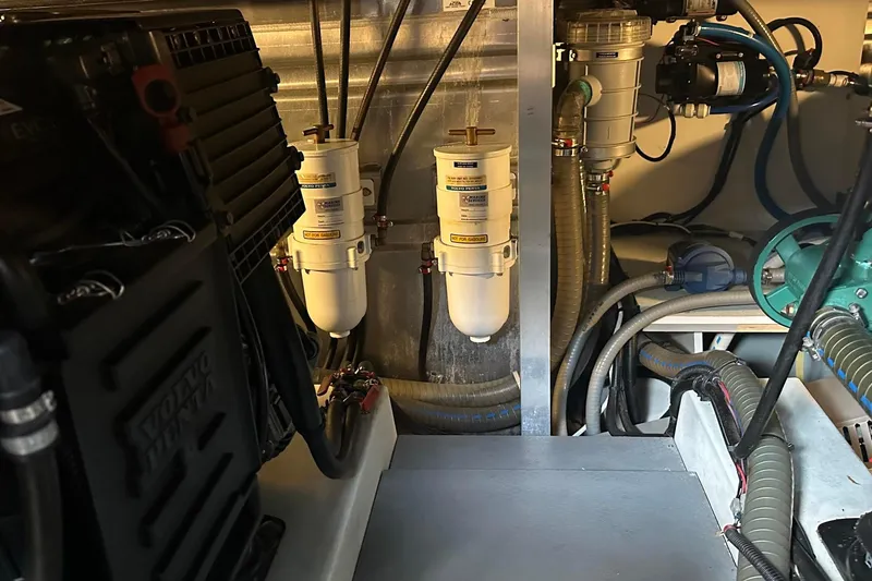 Slide: The Image of Engine room of 2015 Beneteau Swift Trawler 44 with Volvo Penta components and filters. - 42