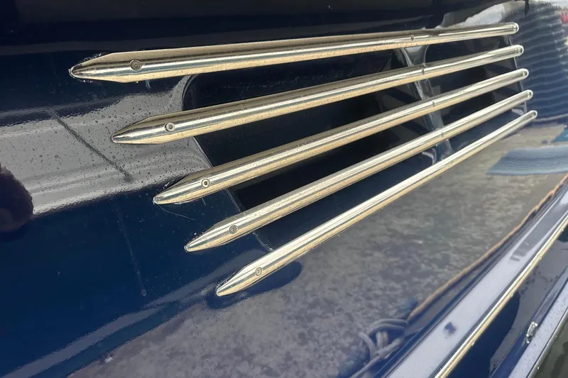 Slide: The Image of Close-up of 2015 Beneteau Swift Trawler 44's metallic side vents. - 8