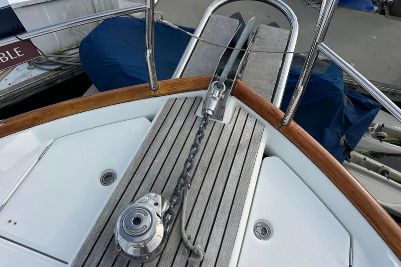 Slide: The Image of Bow of 2015 Beneteau Swift Trawler 44 with anchor chain and windlass. - 9