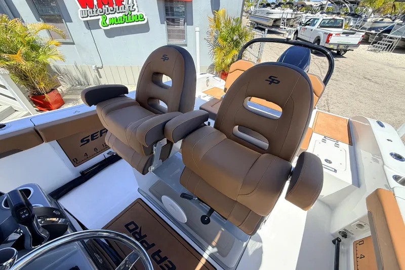 Slide: The Image of 2026 Sea Pro 245FLXR Sandbar boat with luxurious brown seating and modern design. - 22
