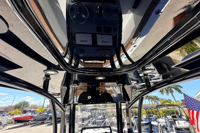 Slide: The Image of 2026 Sea Pro 245FLXR Sandbar boat interior with sleek design and modern controls. - 27