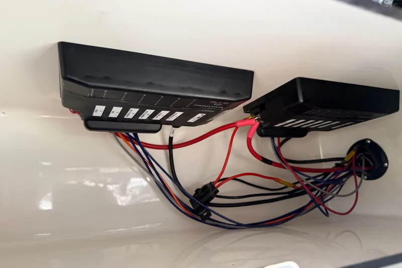 Slide: The Image of Electrical wiring and components inside a 2026 Sea Pro 245FLXR Sandbar boat. - 34