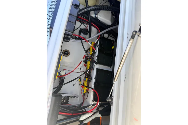 Slide: The Image of Electrical wiring and components inside a 2026 Sea Pro 245FLXR Sandbar boat. - 36