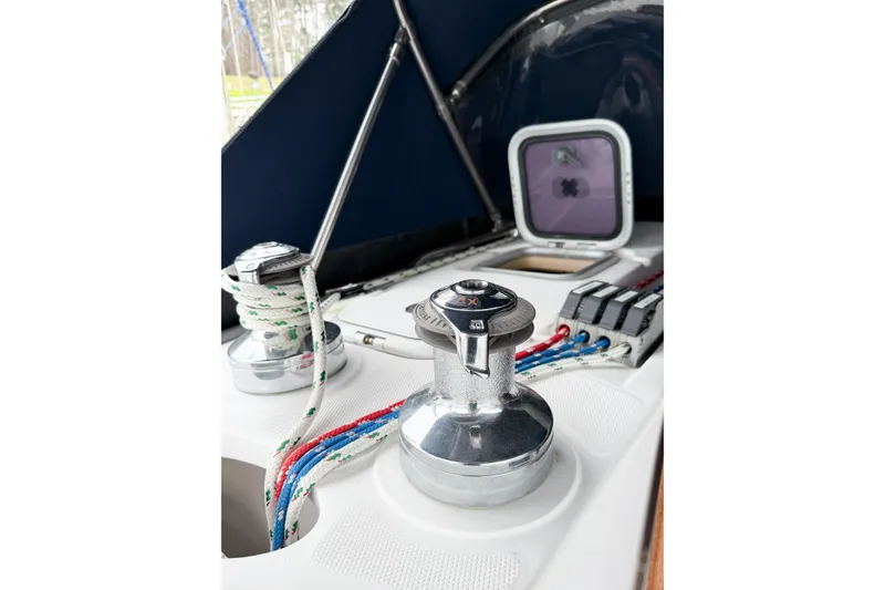 Slide: The Image of Sailboat deck with winches and ropes, Hunter 380, 2002 model. - 76