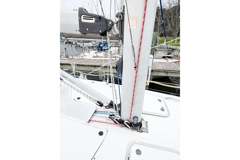 Slide: The Image of Hunter 380 sailboat mast and rigging detail, docked at marina, 2002 model. - 8