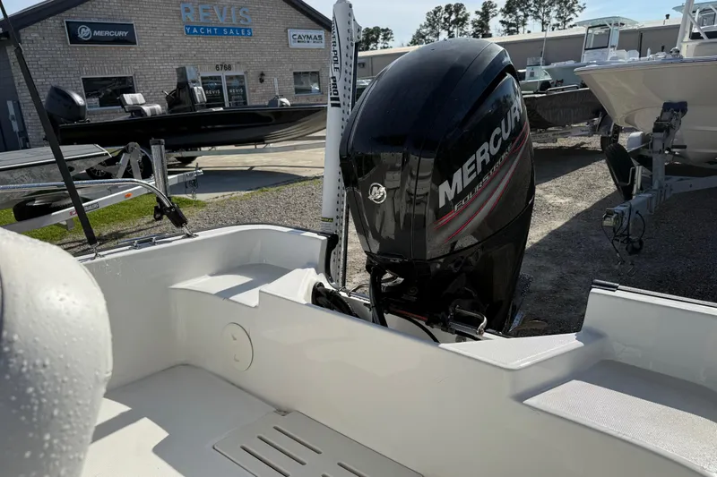 Slide: The Image of 2015 Boston Whaler 170 Montauk with Mercury outboard at yacht sales lot. - 17