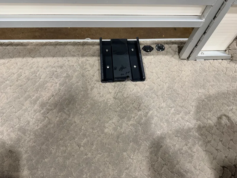 Slide: The Image of Interior of Misty Harbor 2085DF boat, carpeted floor and bracket visible. - 17