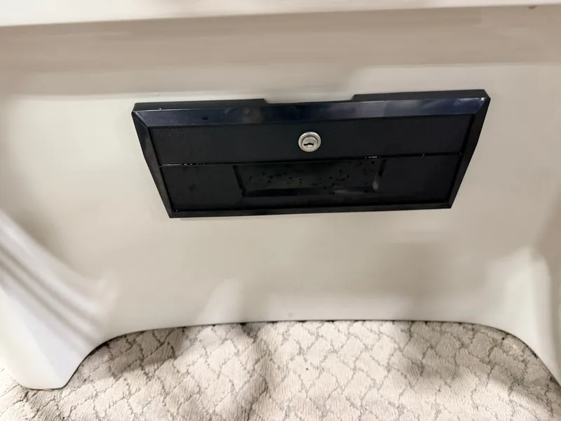 Slide: The Image of Black compartment on a 2010 Misty Harbor boat. - 30