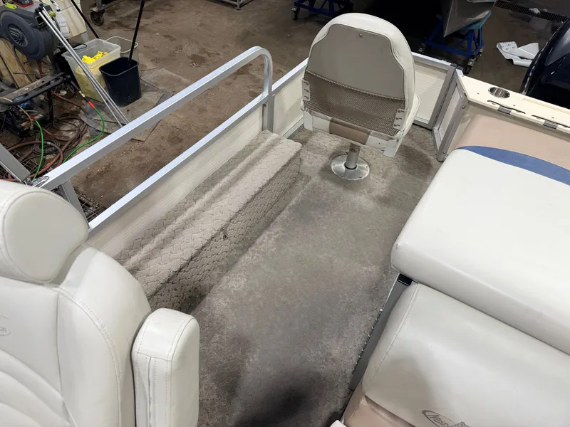 Slide: The Image of Interior of a 2010 Misty Harbor pontoon boat with seating. - 32