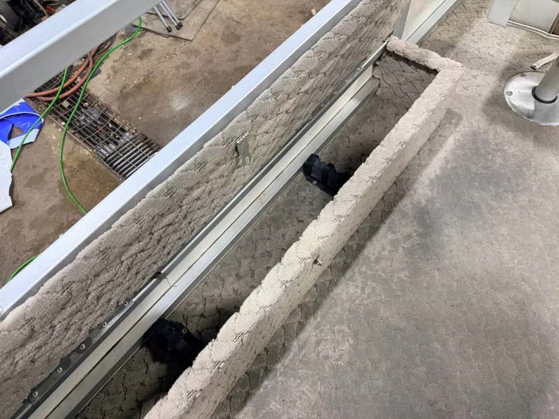 Slide: The Image of Interior of Misty Harbor 2085DF boat, carpeted floor and seating bench. - 33