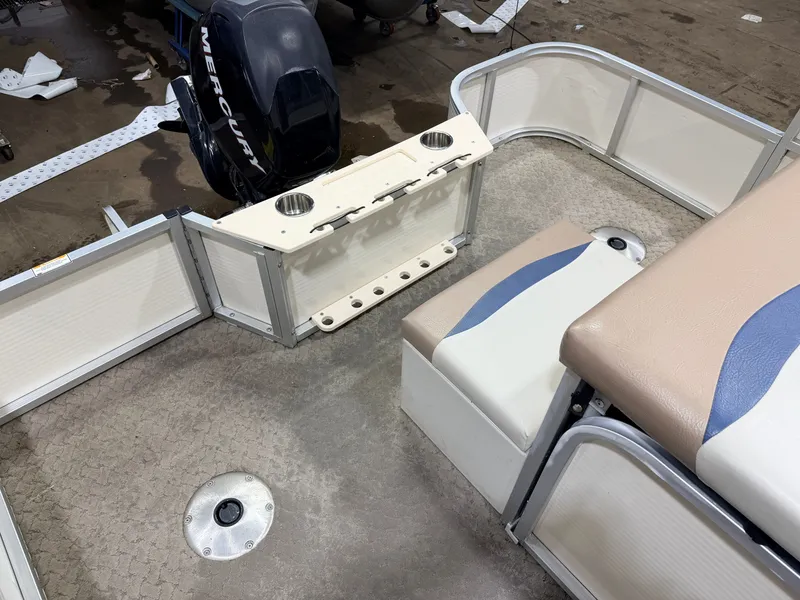 Slide: The Image of 2010 Misty Harbor pontoon boat with Mercury engine, interior view. - 45