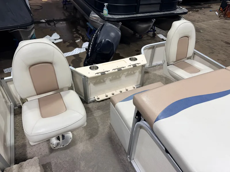 Slide: The Image of Interior of a 2010 Misty Harbor pontoon boat with seating. - 7