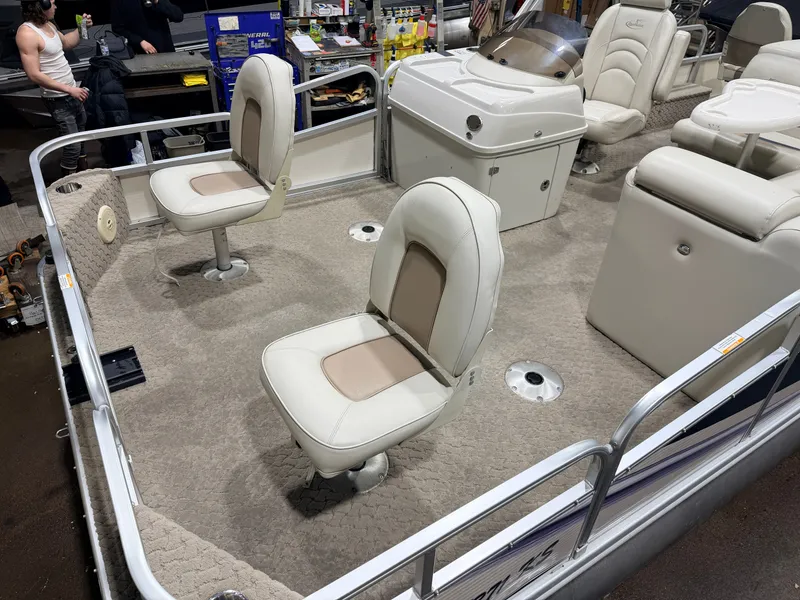 Slide: The Image of Interior of a 2010 Misty Harbor pontoon boat with seating. - 9