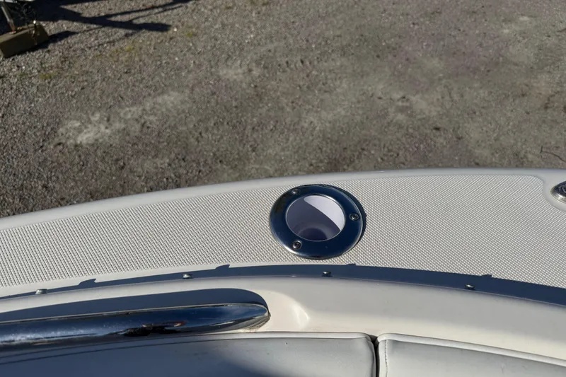 Slide: The Image of 2015 Robalo R227 Dual Console boat deck with cup holder detail. - 11