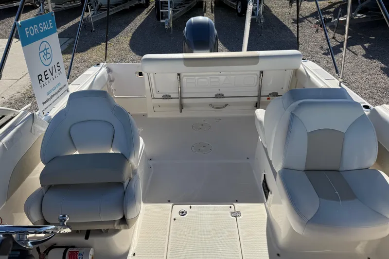 Slide: The Image of 2015 Robalo R227 Dual Console boat interior with seating, for sale by Revis Yacht Sales. - 14