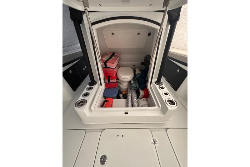 Slide: The Image of 2024 Yellowfin 36 Offshore boat cabin with storage and equipment. - 23