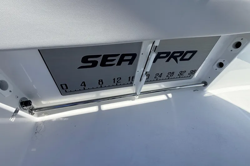 Slide: The Image of 2026 Sea Pro 225FLX Sandbar boat interior with branded measuring panel. - 29