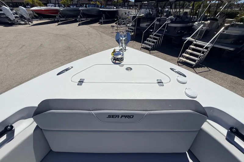 Slide: The Image of 2026 Sea Pro 225FLX Sandbar boat interior, showcasing seating and deck features. - 33