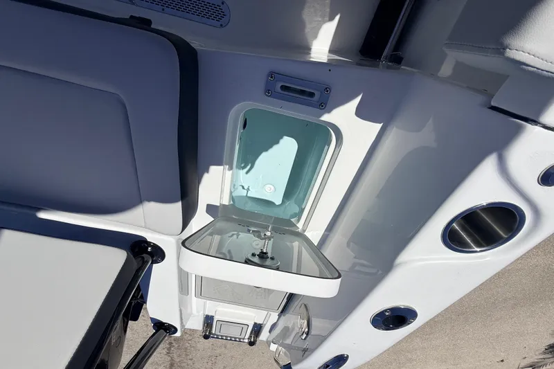 Slide: The Image of Open compartment on 2026 Sea Pro 225FLX Sandbar boat, showcasing interior details. - 37