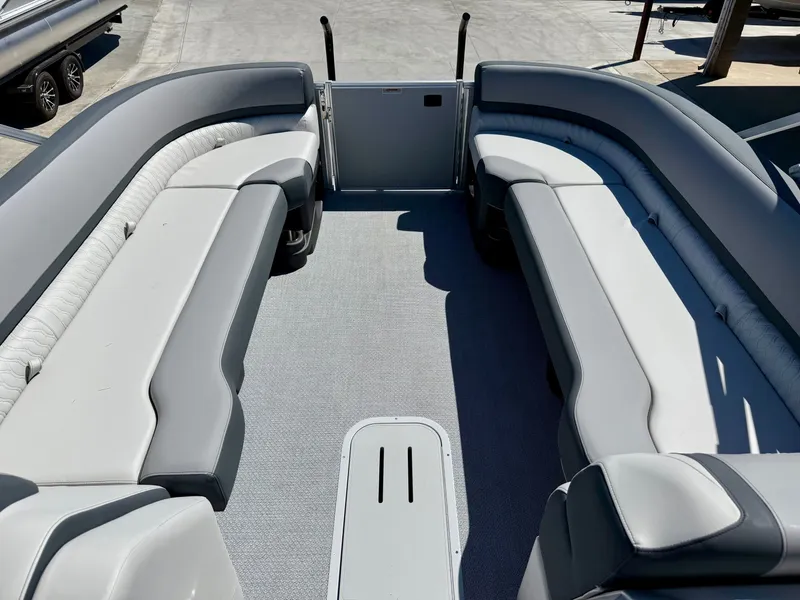 Slide: The Image of Interior of 2026 Avalon Catalina Cruise Funship with gray seating. - 12