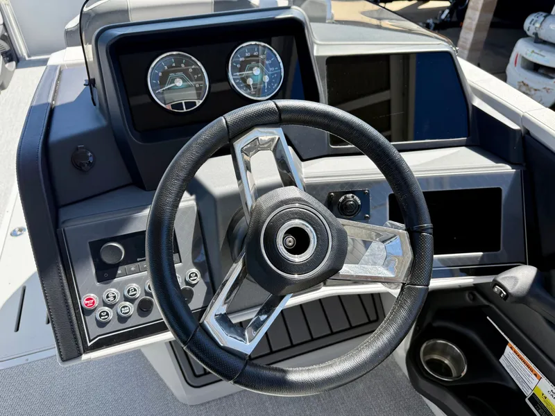 Slide: The Image of Steering console of 2026 Avalon Catalina Cruise Funship with wheel and gauges. - 5