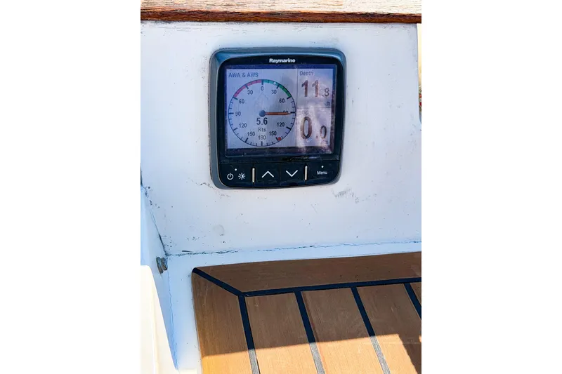 Slide: The Image of Raymarine instrument panel on 1986 Nauticat 40 sailboat, displaying speed and depth. - 100