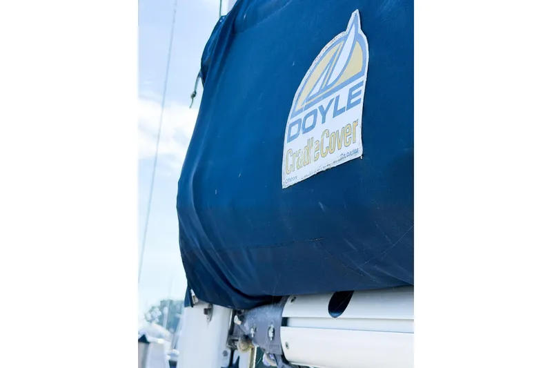Slide: The Image of Blue sail cover on 1986 Nauticat 40 with Doyle Cradle Cover logo. - 16