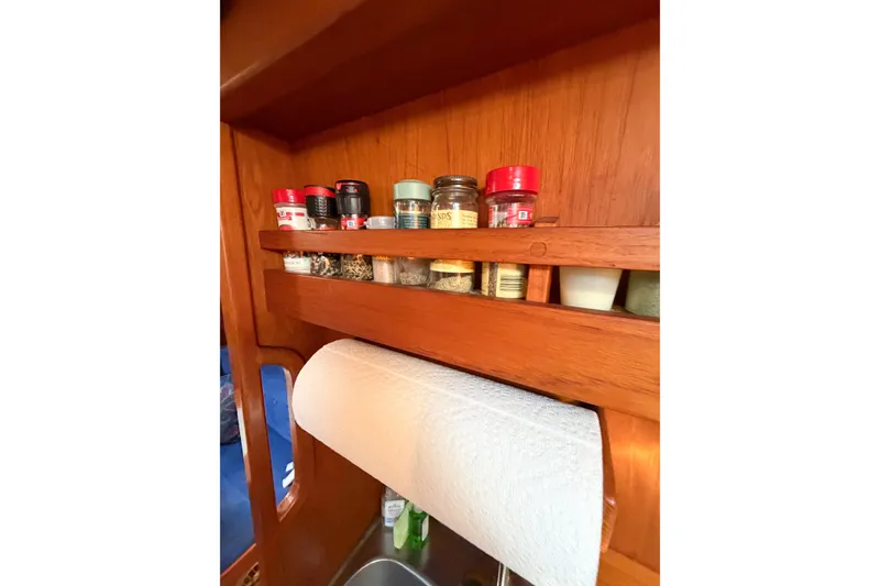 Slide: The Image of Spice rack and paper towel holder in 1986 Nauticat 40 yacht kitchen. - 79