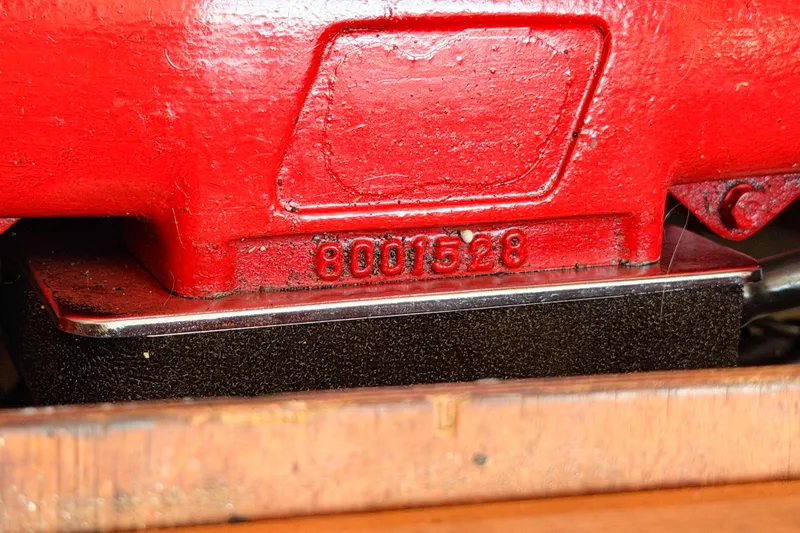 Slide: The Image of Red engine part with serial number 8001528, Nauticat 40, 1986 model. - 87