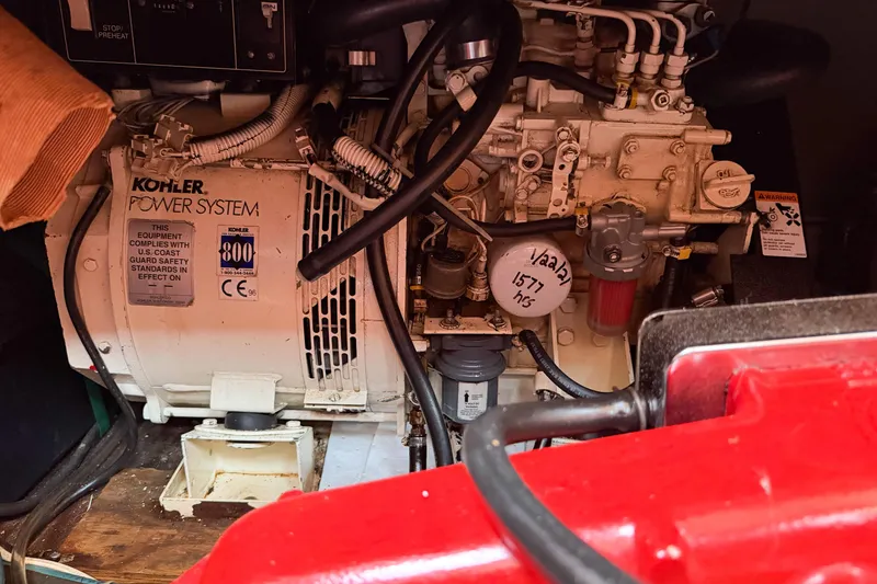 Slide: The Image of Engine room of 1986 Nauticat 40 with Kohler power system and wiring. - 92