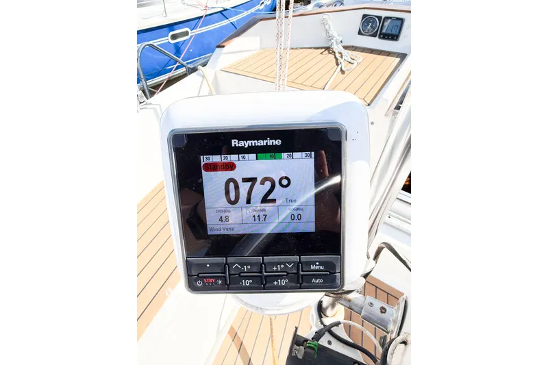 Slide: The Image of Raymarine navigation display on 1986 Nauticat 40 sailboat, showing course heading of 072 degrees. - 99