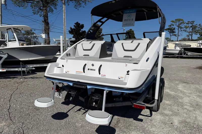 Slide: The Image of 2024 Yamaha Boats AR220 displayed outdoors, showcasing sleek design and modern features. - 7