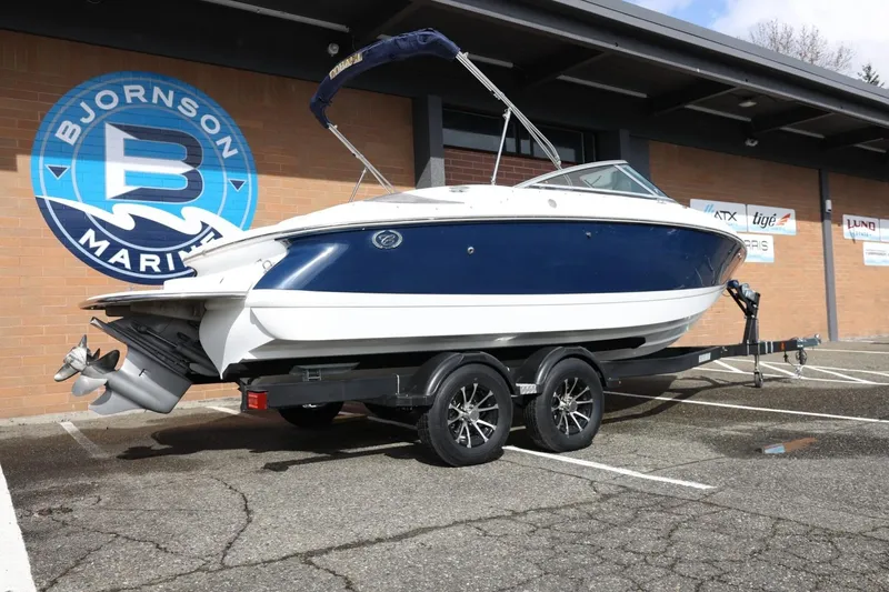 Slide: The Image of 2005 Cobalt 200 boat on trailer at Bjornson Marine dealership. - 14