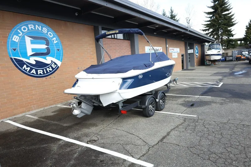 Slide: The Image of 2005 Cobalt 200 boat on trailer at Bjornson Marine dealership. - 31