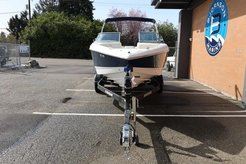 Slide: The Image of 2005 Cobalt 200 boat on trailer at Bjornson Marine parking lot. - 5