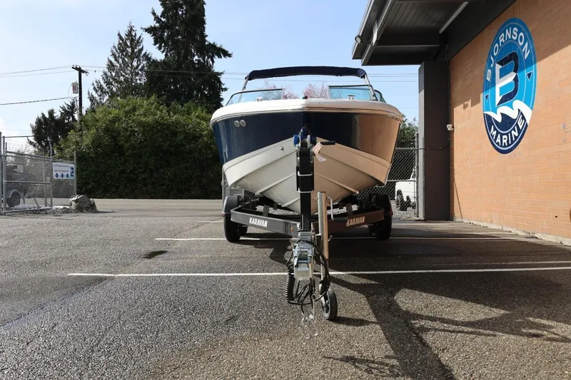 Slide: The Image of 2005 Cobalt 200 boat on trailer at Bjornson Marine parking lot. - 6