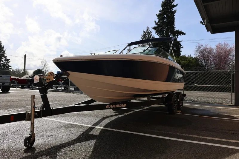 Slide: The Image of 2005 Cobalt 200 boat on Karavan trailer in parking lot. - 8