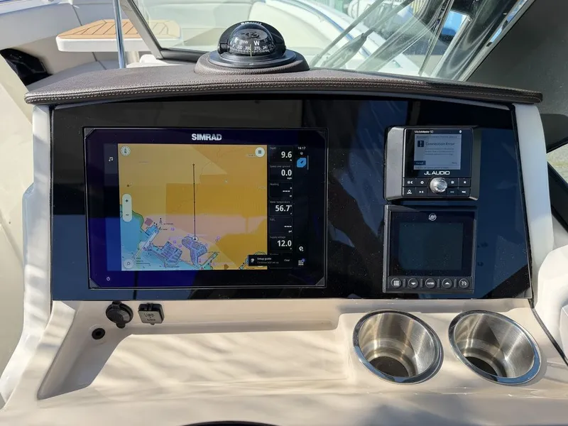 Slide: The Image of 2023 Boston Whaler 240 Vantage boat console with navigation system. - 11