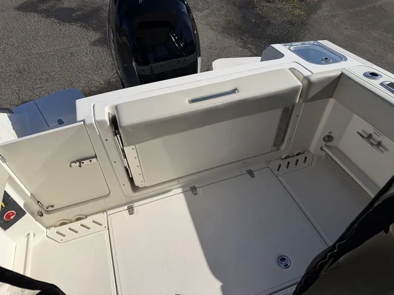 Slide: The Image of Interior of 2023 Boston Whaler 240 Vantage with seating and storage. - 8