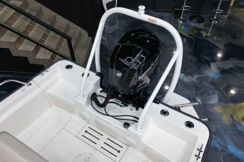 Slide: The Image of 2025 Boston Whaler 170 Montauk boat with Mercury engine, interior view. - 5