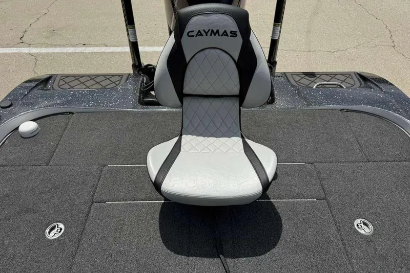 Slide: The Image of 2025 Caymas CX 20 PRO boat seat on a carpeted deck. - 26