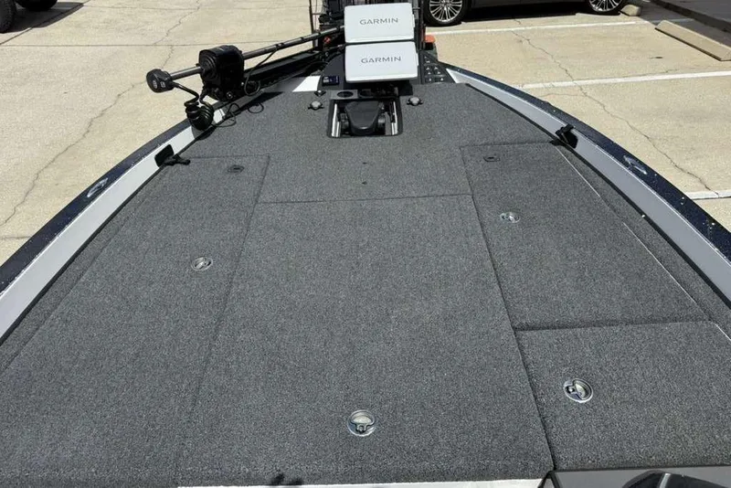 Slide: The Image of 2025 Caymas CX 20 PRO boat deck with Garmin electronics and carpeted surface. - 31