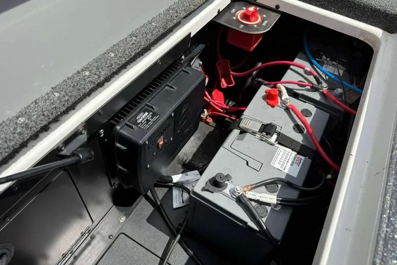 Slide: The Image of Battery compartment of 2025 Caymas CX 20 PRO boat, featuring wiring and connections. - 42