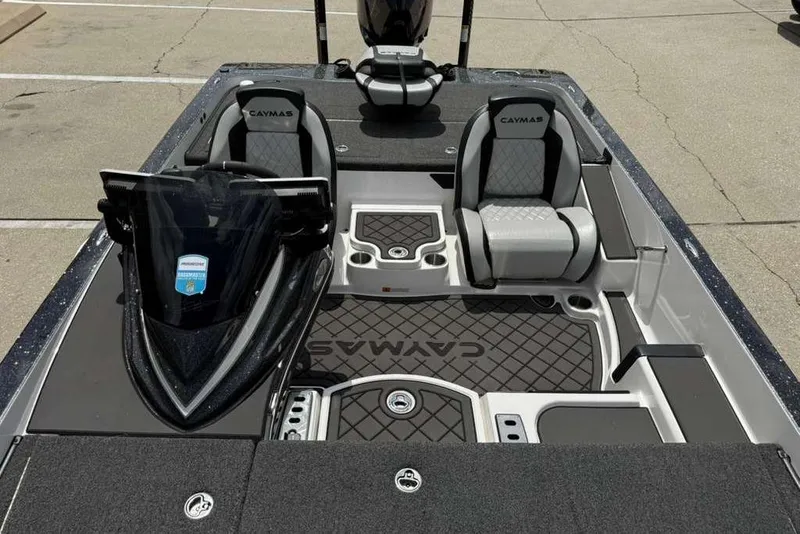 Slide: The Image of 2025 Caymas CX 20 PRO boat interior with dual seats and sleek dashboard design. - 46