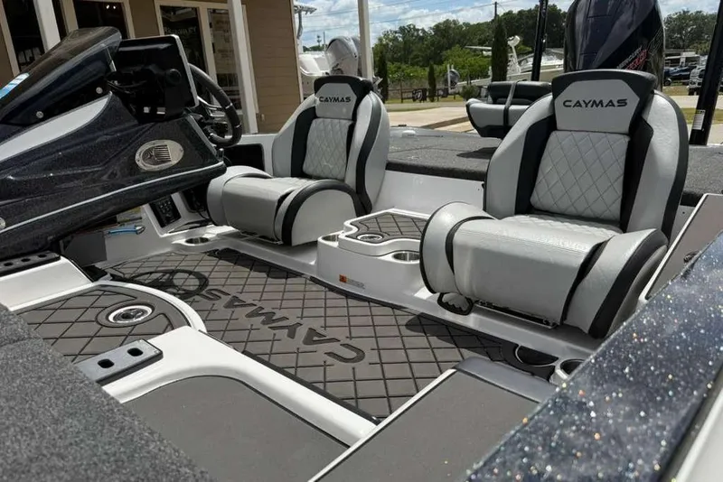 Slide: The Image of 2025 Caymas CX 20 PRO boat interior with luxurious seating and modern dashboard. - 47