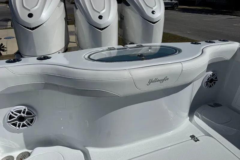 Slide: The Image of 2026 Yellowfin 36 Offshore boat interior with triple engines and sleek design. - 10